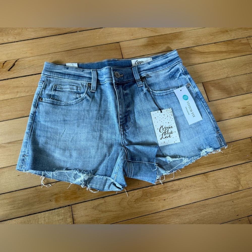 NWT Cosmic Blue Love blue denim raw hem shorts
